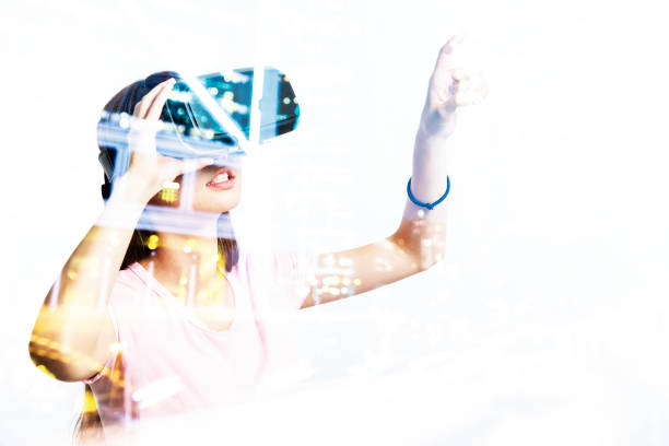 istock Double exposure of people using the virtual reality headset 649121958