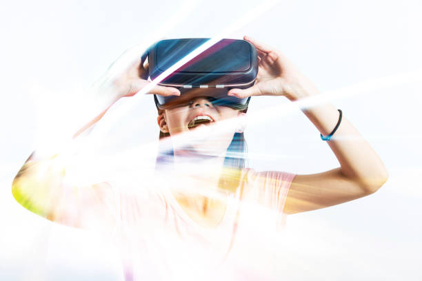 istock Double exposure of people using the virtual reality headset 649122232