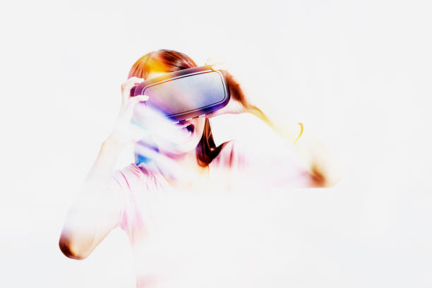 istock Double exposure of people using the virtual reality headset 649124622