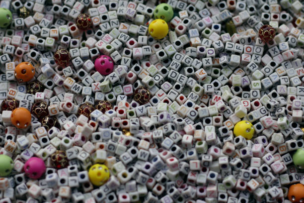 istock Letter Beads and other type beads filled in the frame. 649125474