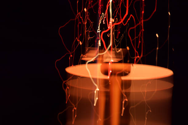 istock Blurred Motion Of Tea Light Candles Burning In Darkroom 649128151