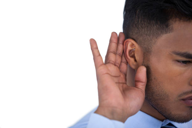 istock Businessman listening with hand on ear 649133680