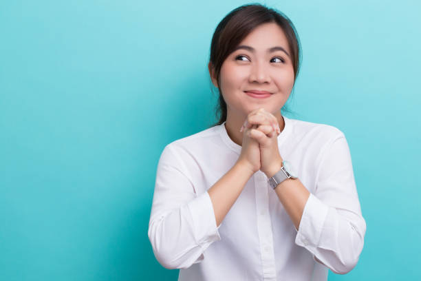 istock Asian woman thinking and happy 649136012