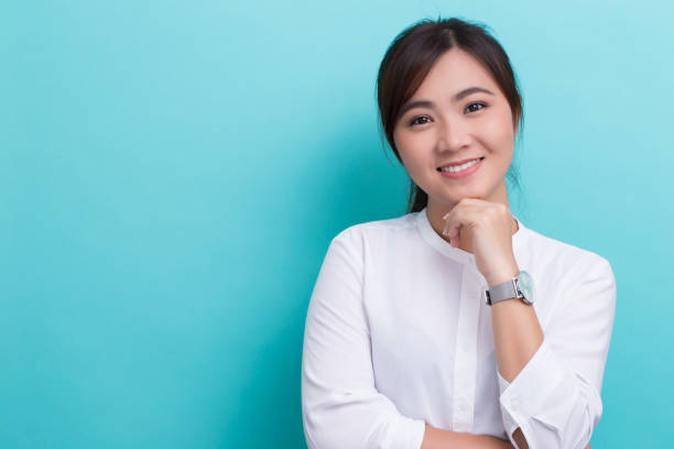 istock Asian woman with her watch 649136248