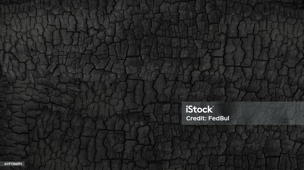 Black background Grunge. Burned wood texture. Black background Textured Stock Photo