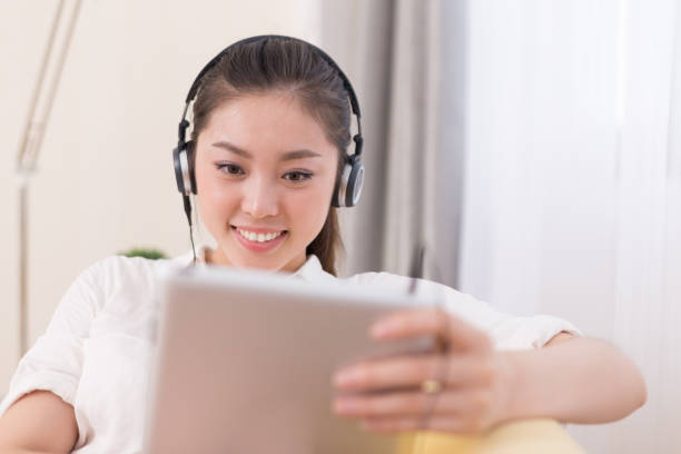istock young pretty woman relaxes in room 649140422
