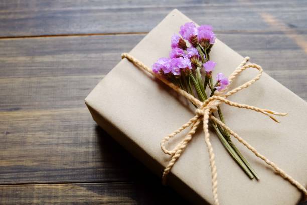 istock gift with dry flower on the table 649140560