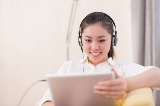 istock young pretty woman relaxes in room 649140790