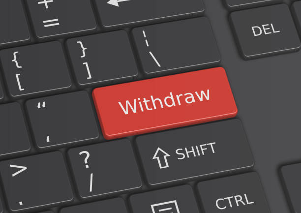 istock A 3D illustration of the word Withdraw written on the keyboard 649141006