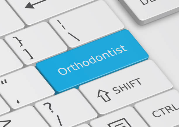 istock The word Orthodontist written on the keyboard 649141126