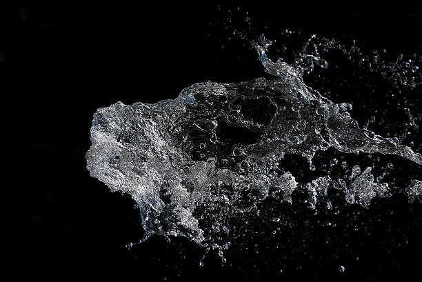 istock Close-Up Of Water Flowing Against Black Background 649142983