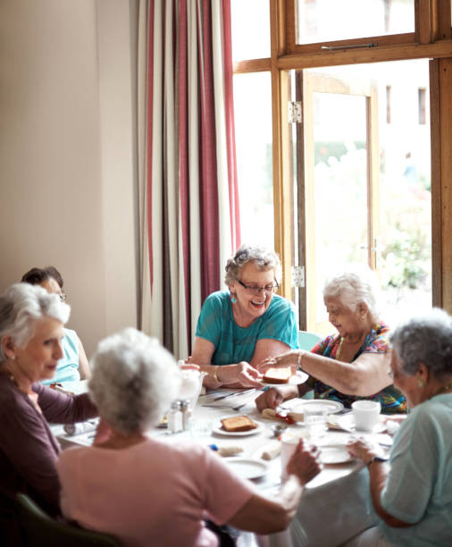 istock Sharing a meal with old friends 649145218