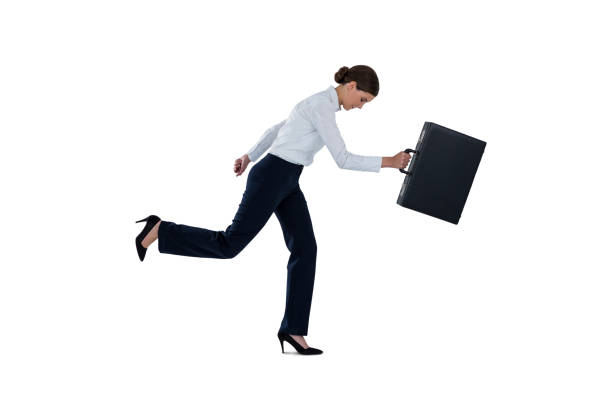 istock Businesswoman running with a briefcase 649147928