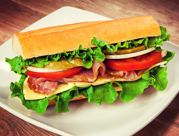 istock Tasty sandwich on the table 649148730