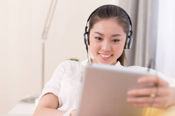 istock young pretty woman relaxes in room 649148880