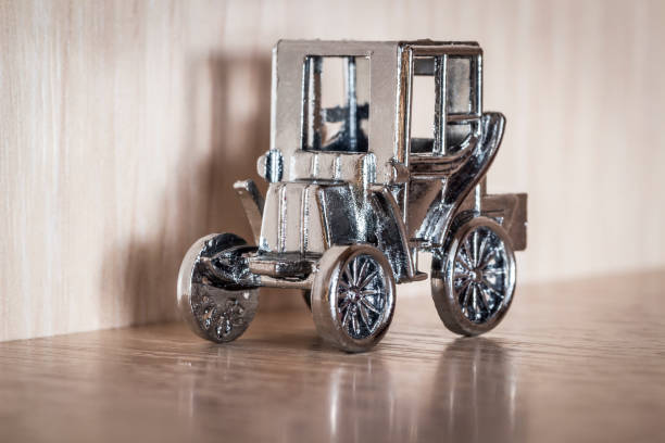 Metal chrome model vintage car closeup.