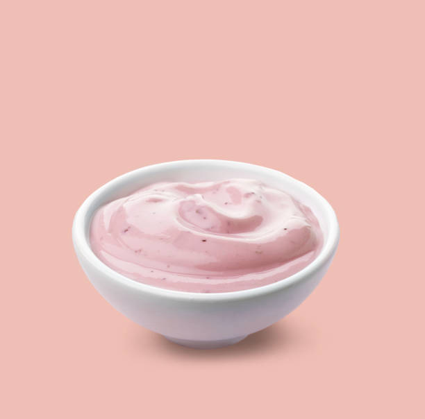 istock bowl of pink fruit yogurt 649157380