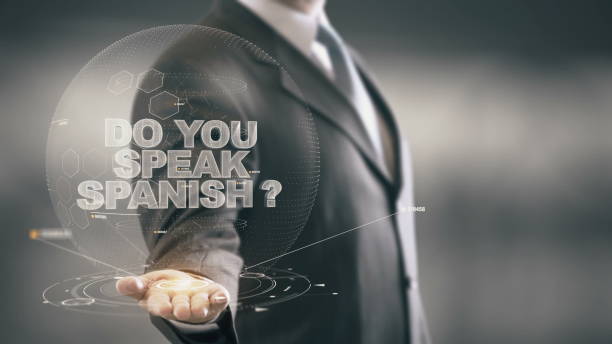 istock Do Your Speak Spanish Businessman Holding in Hand New technologies 649157412
