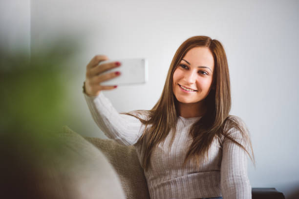 istock Women taking selfie at home 649163716