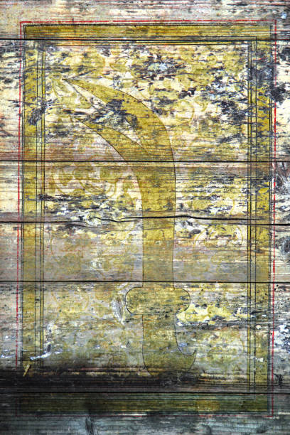 istock Old figurine  painted on a grunge plank 649164154
