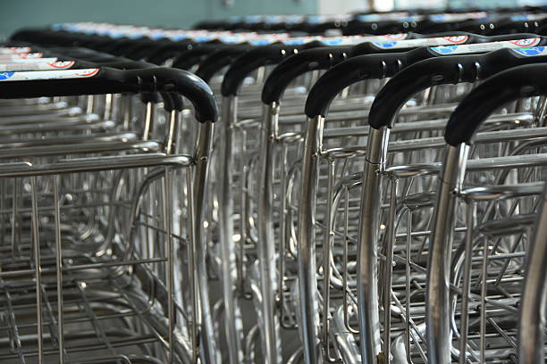 istock Row Of Shopping Carts 649169243