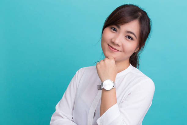 istock Asian woman with her watch 649175650