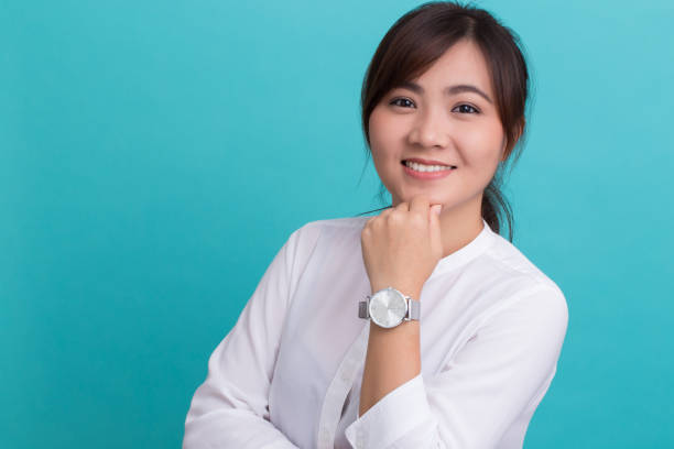 istock Asian woman with her watch 649175942