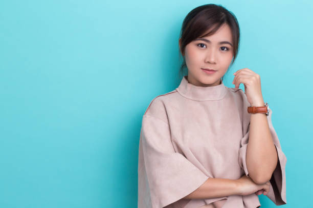 istock Confident asian woman on isolated background 649178792