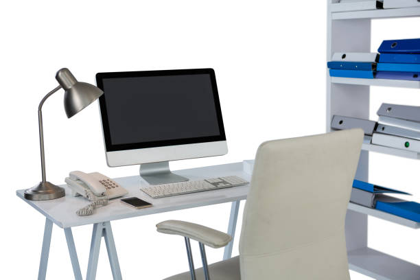 istock Computer with telephone and mobile phone at desk 649183914