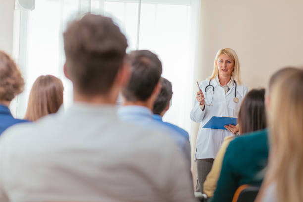 istock Science and research programme on medical class with senior female professor 649185438