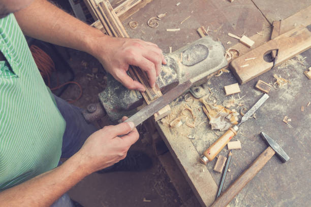 istock Carpenter's little working tools on a dusty table. 649188688