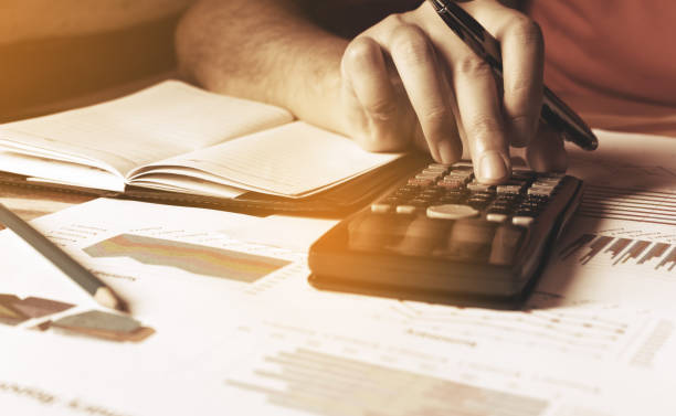 istock Businesswoman calculate finance and thinking about problem. 649191336
