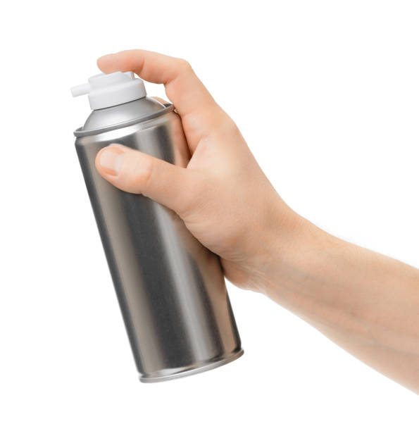 istock spray can in the male hand on white background 649191578
