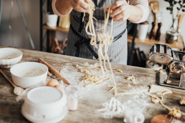 istock Woman holding homemade pasta 649192220