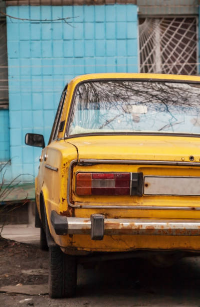 istock Near the wall is a blue yellow old Soviet machine, Kiev, Ukraine, March 2016 649198184