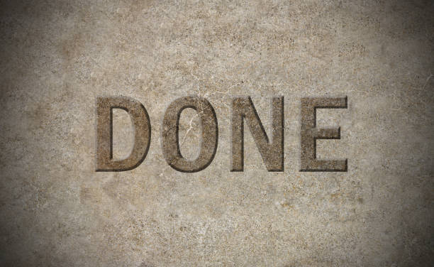 istock DONE sign carved out in stone 649205832
