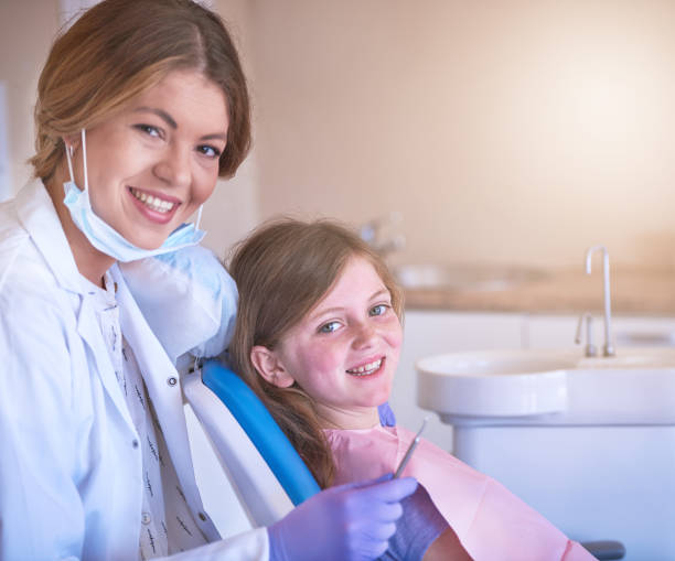 istock She's specially trained for children's dental needs 649215420