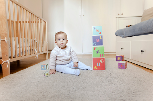 istock Baby playing in his room 649219138
