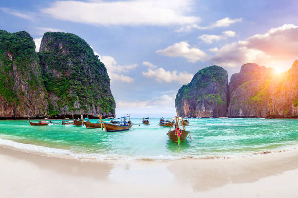 istock Long boat and blue water at Maya bay in Phi Phi Island. 649219642