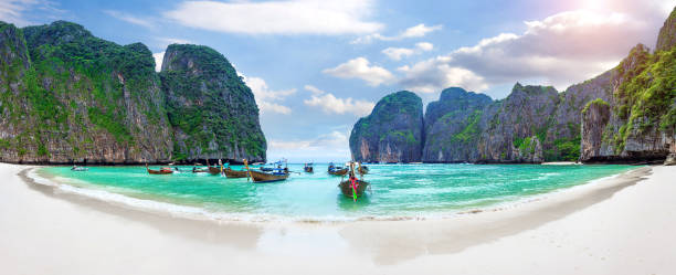 istock Long boat and blue water at Maya bay in Phi Phi Island. 649219654