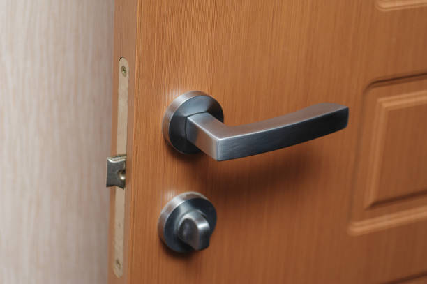 Metal handle on Chinese red wooden door