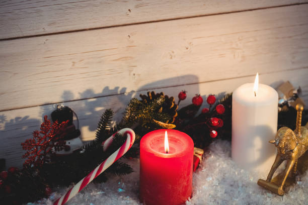 istock Christmas decorations against wooden wall 649229394