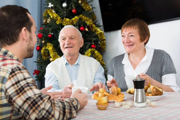 istock Parents and son enjoying Christmas evening 649232094