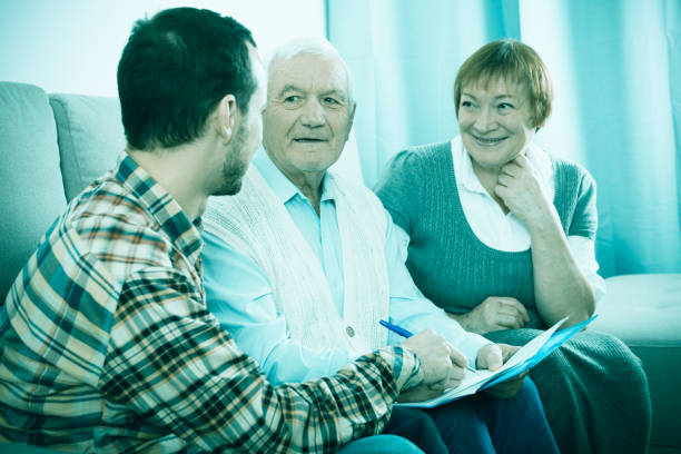 istock Elderly couple and insurance agent 649232126