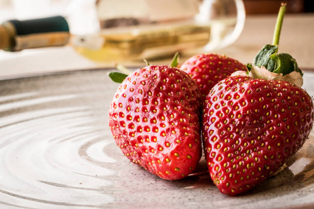 istock Strawberry and white wine. Luxury concept. 649232364