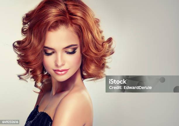 Beautiful Model Brunette With Middle Length Curled Hair And Bright Make Up Stock Photo - Download Image Now