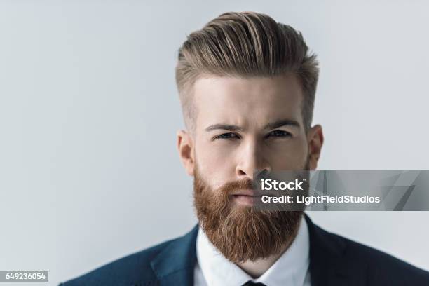 Closeup Portrait Of Handsome Bearded Businessman Looking At Camera Stock Photo - Download Image Now