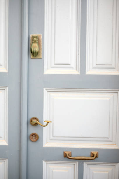 istock Old door handle in a typical painted blue on the of Santorini 649236252