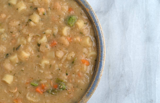 istock White bean soup in a bowl on a marble table 649240124