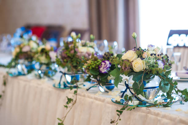 istock decor of flowers on wedding table bride and groom 649242814